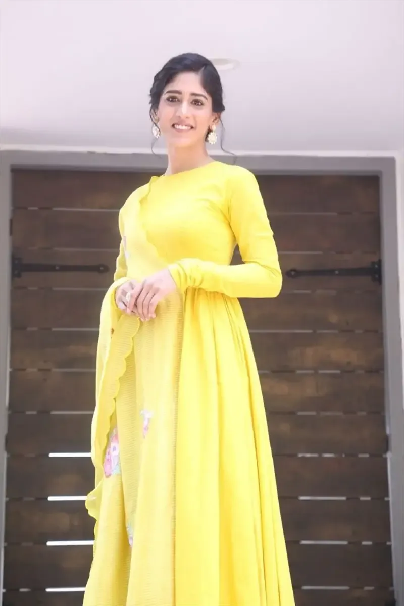 ACTRESS CHANDINI CHOWDARY IN YELLOW DRESS AT MOVIE TEASER LAUNCH 11